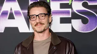 Pedro Pascal Struts in a Statement Tee, with Lux by His Side